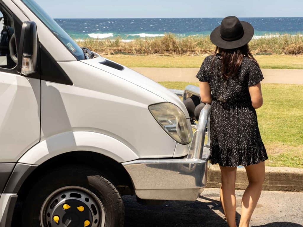 Girl with campervan van life costs budgeting