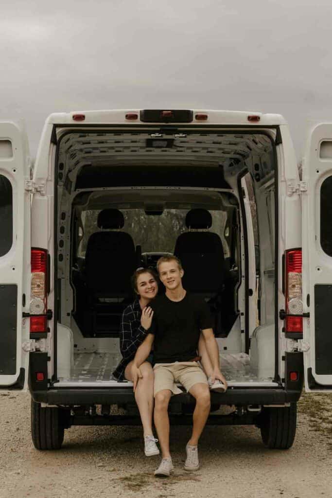 man and woman in van before build