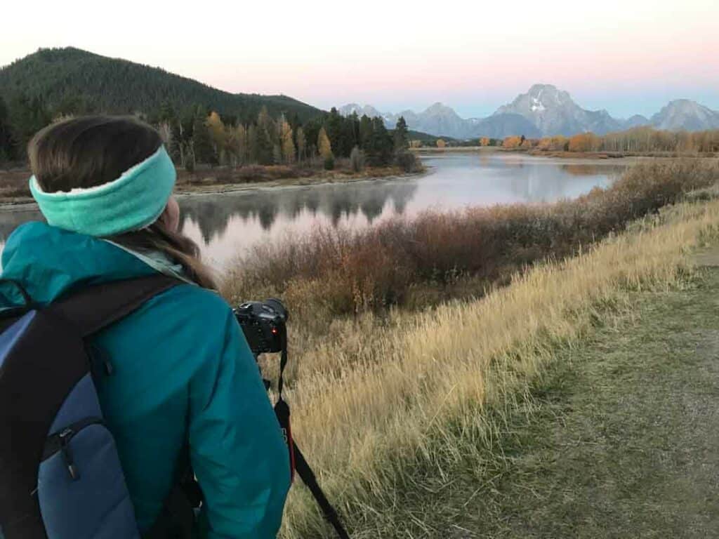 Woman taking photos at Grand Teton National Park