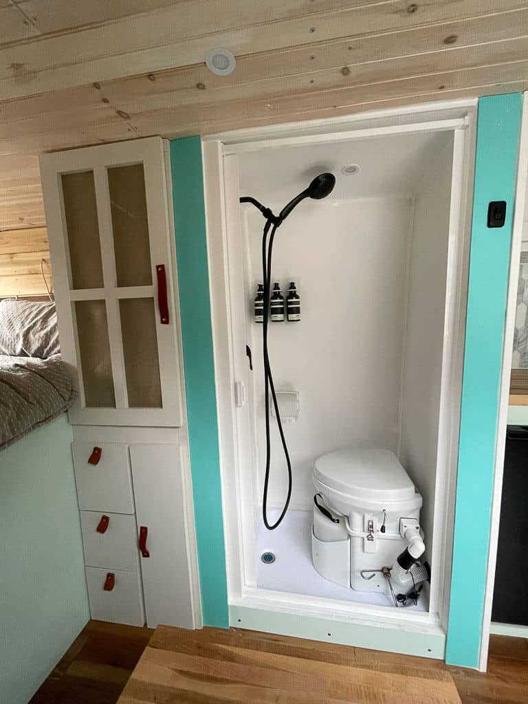 Wet bathroom with toilet in a camper van build