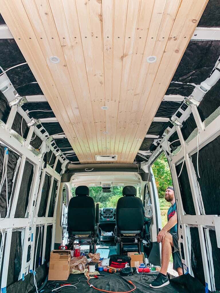 Wood plank ceilng in a unfinished van build